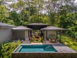 Japanese style home with pool surrounded by lush jungle in Dominical, Costa Rica.