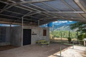 Horse stable with covered roof and mountain view in Dominical, Costa Rica.