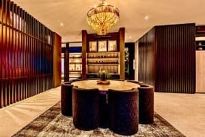 Elegant interior of a luxury Costa Rican home with modern decor and warm lighting.