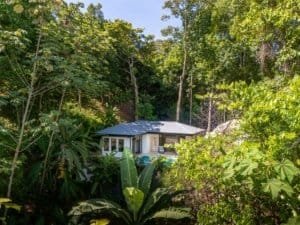Costa Rica ocean view home with pool and lush greenery in Dominical.