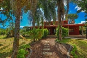 Beautiful hacienda style home with stables and lush garden in Dominical, Costa Rica.