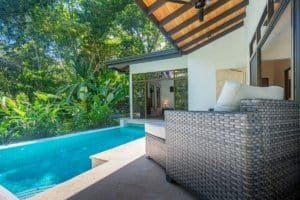 Modern Costa Rican home with pool and lush jungle views.