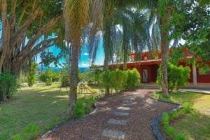 Beautiful hacienda style home with stables and lush garden in Dominical, Costa Rica.
