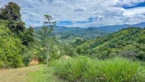 Beautiful landscape of lush green hills and mountains in Dominical, Costa Rica.