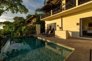 Luxury villa with pool, ocean view, and balcony near Dominical beach.