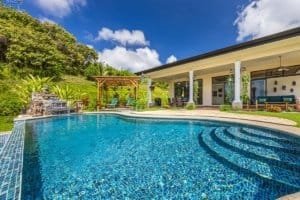 Beautiful whitewater ocean view home with infinity pool and manicured garden.