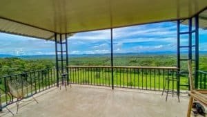 Spacious balcony with jungle and mountain views in Dominical, Costa Rica.