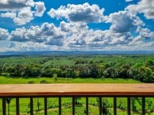 Beautiful view of lush jungle, mountains, and sky from a Costa Rican property.