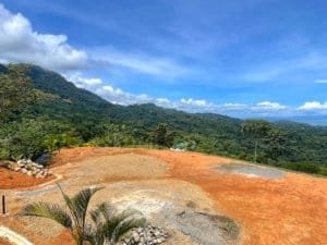 Fenced and gated land with ocean view, ready to build, in Dominical, Costa Rica.