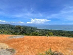 Stunning ocean view from fenced and gated land in Dominical, Costa Rica.