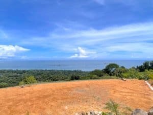 Fenced land with ocean view, ready to build, in Dominical, Costa Rica.