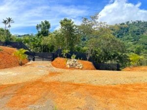 Fenced and gated land with ocean view in Dominical, Costa Rica.