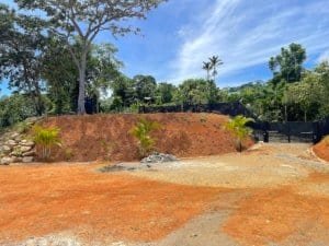 Fenced and gated land with ocean view in Dominical, Costa Rica.