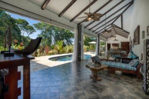 Spacious covered patio with pool and tropical garden in Dominical.