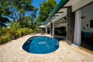Luxury pool and patio area at a Bali-style home in Dominical, Costa Rica.
