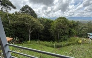 Scenic mountain view with lush trees near Dominical, Costa Rica.
