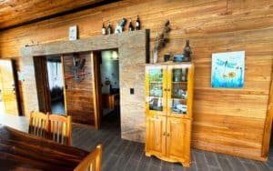Warm wooden interior with dining area and decorative accents in Dominical.