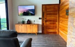 Interior of a mountain home in Costa Rica with wooden walls and modern decor.