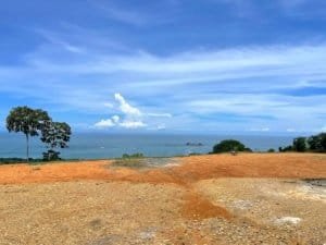 Fenced and gated land with ocean view in Dominical, Costa Rica.