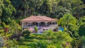 Elegant Costa Rican luxury home with ocean and mountain views.