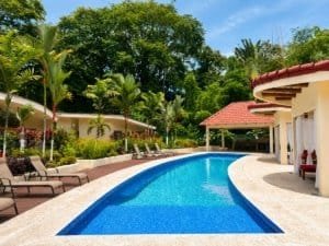 Luxury pool with garden view and resort amenities in Dominical, Costa Rica.