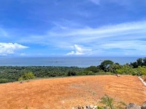 Fenced land with ocean view, ready to build, in Dominical, Costa Rica.