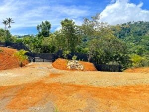 Fenced and gated land with ocean view in Dominical, Costa Rica.