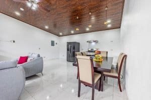Spacious dining area with modern kitchen and seating in Dominical Costa Rica.