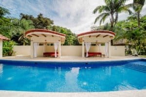 Luxury private pool villa with cabanas and tropical garden in Dominical.