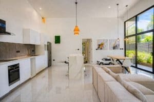 Dominical real estate: modern 3-bedroom home with pool, spacious living area and walk-to-town access.
