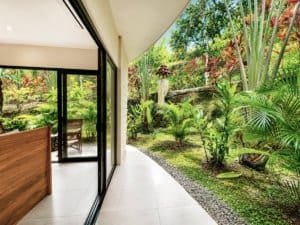 Beautiful garden view from a 2-bedroom condo with resort amenities in Dominical.