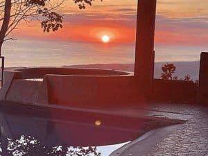 Beautiful ocean sunset view from a tropical estate in Dominical, Costa Rica.