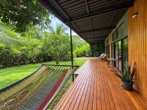 Relaxing porch with hammock and lush garden near Dominical.