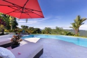 Beautiful pool area with ocean and mountain views in Dominical, Costa Rica.