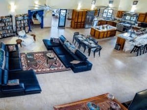 Open-concept living room with modern furniture and kitchen in Dominical.