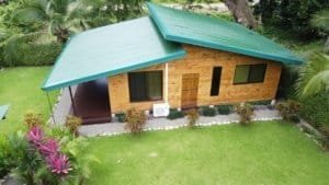 Dominical area 2-bedroom turn-key coastal home with green roof and lush garden.
