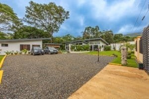 Dominical Costa Rica real estate: communal driveway with villas and parking area.