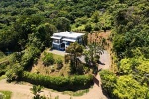 Modern 4-bedroom home with pool and lush garden near the beach in Dominical.