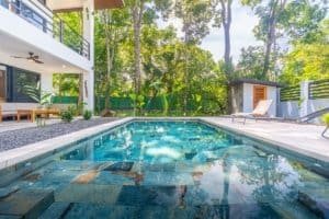 Dominical condo with private pool and lush garden view.