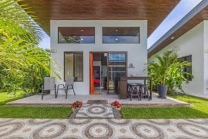 Dominical real estate modern villa with pool and patio area.