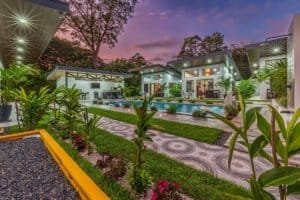 Turnkey villa complex with pool and landscaped garden in Dominical, Costa Rica.