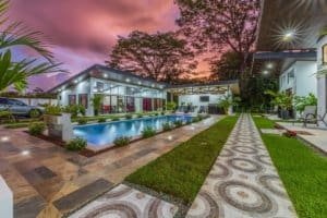 Turnkey 5-bedroom villa estate with pool, modern pavilion, and landscaped courtyard in Dominical.