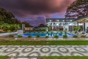 Turnkey 5-bedroom villa with pool and modern outdoor lounge at Dominical, Costa Rica.