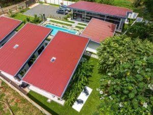 Dominical real estate: turnkey 5-bedroom villa complex with pool and rental villas.