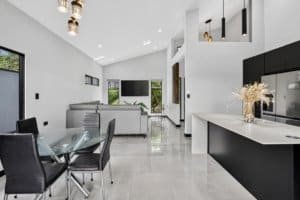 Contemporary living room with sleek design and mountain views in Dominical.