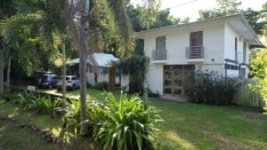 Contemporary house with lush garden and tropical trees in Dominical.