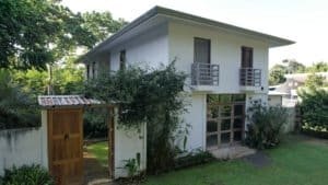 Charming two-story house with garden and garage in Uvita, Costa Rica.