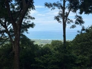 Scenic ocean view from rainforest land in Matapalo, Costa Rica.