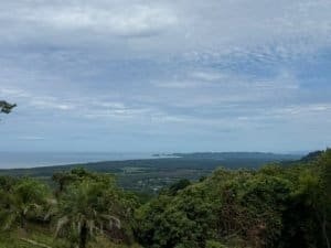 Beautiful ocean and sunset view from hillside in Dominical, Costa Rica.