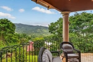 Balcony view of lush mountains and greenery in Dominical, Costa Rica.